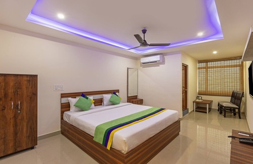 Bengaluru Hotel | Discover Treebo Nandi Comforts: Family-Friendly Stay