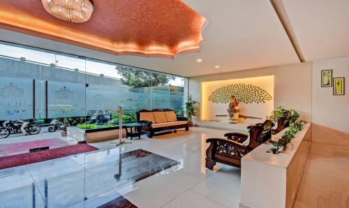 Nagavara Hotel | Family-Friendly Retreat at Treebo Raj Elegance Nagavara