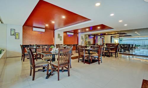 Nagavara Hotel | Family-Friendly Retreat at Treebo Raj Elegance Nagavara