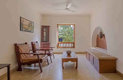 Kannur Hotel | Relax at Treebo Sadhoo Heritage Spa with Pool & Kitchen