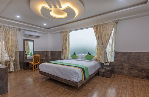 Piriyapatna Hotel | Treebo Siri Ambari Resorts: Family-Friendly Retreat with Spa
