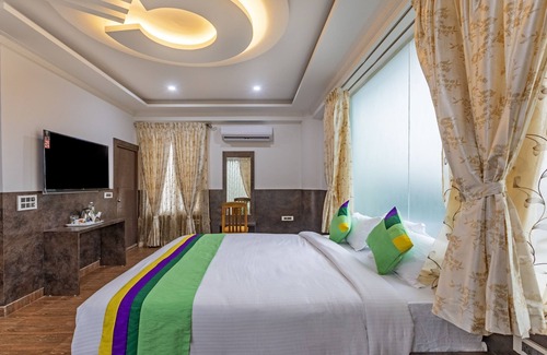 Piriyapatna Hotel | Treebo Siri Ambari Resorts: Family-Friendly Retreat with Spa