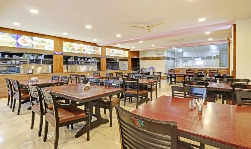 Bidadi Hotel | Treebo SK Suites: Family-Friendly Stay with Dining Options