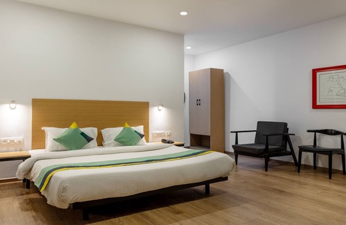 Central Chennai Hotel | Welcoming Treebo Treetops Inn - Family-Friendly Retreat