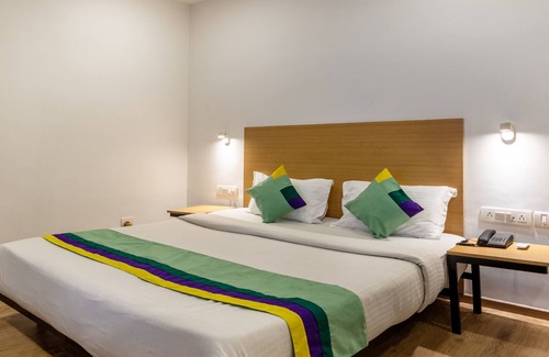 Central Chennai Hotel | Welcoming Treebo Treetops Inn - Family-Friendly Retreat