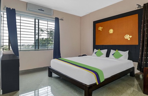 Gundlupet Hotel | Family-Friendly Stay at Treebo Trend Grand JP Inn