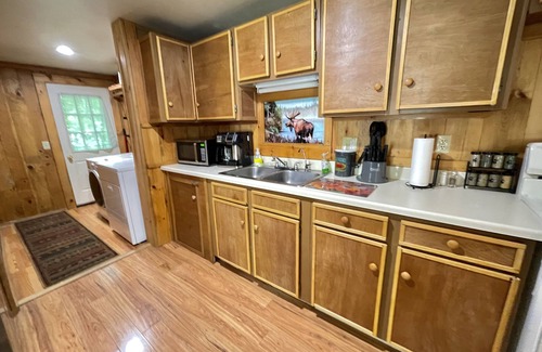 Dedham Cabin | Cozy Treehouse Cabin with Lake Views Near Green Lake