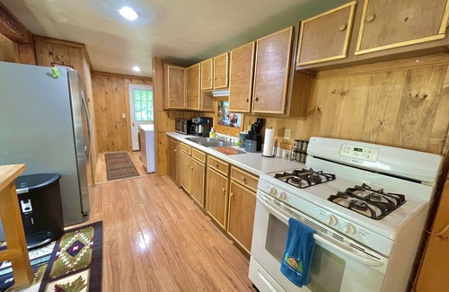 Dedham Cabin | Cozy Treehouse Cabin with Lake Views Near Green Lake