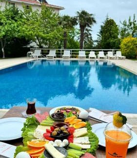 Karaburun Koyu Hotel | Relaxing Treekos Suite Hotel with Oceanfront Views & Spa