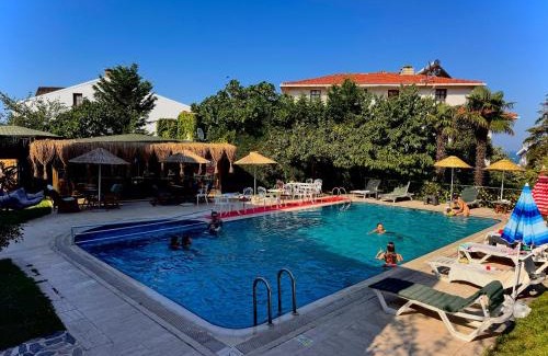 Karaburun Koyu Hotel | Relaxing Treekos Suite Hotel with Oceanfront Views & Spa