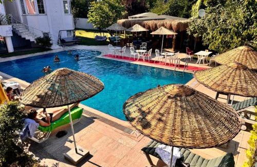 Karaburun Koyu Hotel | Relaxing Treekos Suite Hotel with Oceanfront Views & Spa