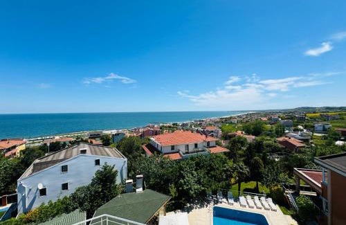 Karaburun Koyu Hotel | Relaxing Treekos Suite Hotel with Oceanfront Views & Spa