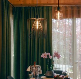 Riva del Garda Resort | Idyllic TreeLodgy: Oceanfront Escape with Pool & Spa