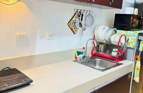 Novaliches Hotel | Relax at Trees Residences by Jhoy: Pool, Spa & Family Fun