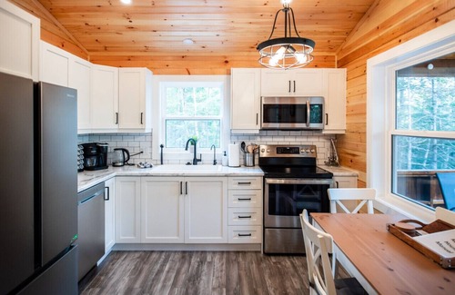 Smiths Corner House | Nature-Inspired Treeside Retreat with Hot Tub & Lake Views