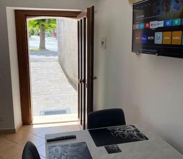 Longano Apartment | Modern TreeStay Apartment: Family-Friendly & Highly Rated