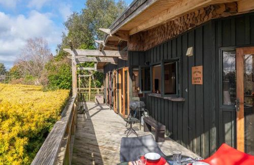 Taupo House | Relaxing Treetop Hideaway in Taupo - Family & Pet Friendly
