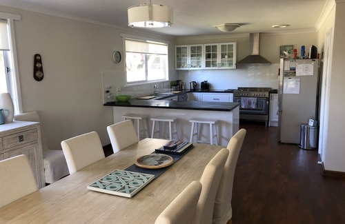 Augusta House | Riverside Escape: Treetops with Stunning River Access