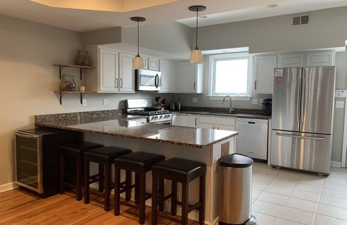 Tremont House | Modern Tremont Townhome with Rooftop Deck & Skyline Views