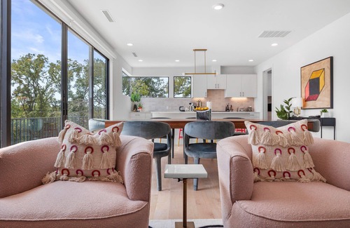 MLK House | Trendy East Austin Condo with Rooftop Deck and City Views