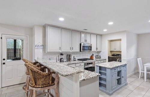 North Central Carrollton House | Stylish Retreat with Heated Pool and Game Room for Families