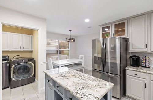 North Central Carrollton House | Stylish Retreat with Heated Pool and Game Room for Families