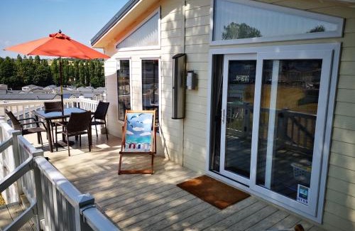 Dawlish Warren House | Discover Trevellian: Scenic Boutique Lodge with Ocean Views