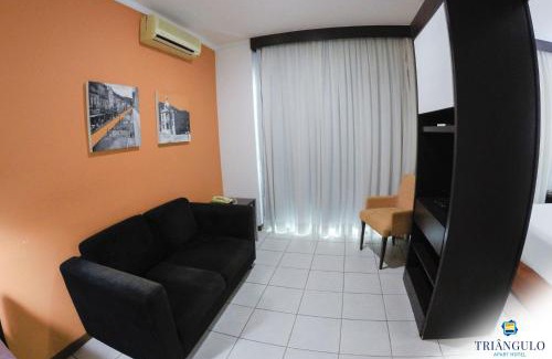 Triangulo das Bermudas Hotel | Inviting Triângulo Apart Hotel with Pool & Child-Friendly Space