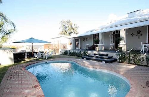 Adelaide House | Inviting Tri-Angle B&B: 4-Star Stay with Hot Tub & Breakfast