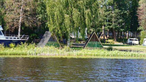Hameenlinna Other | Experience Triangeli Glamping with Oceanfront Views