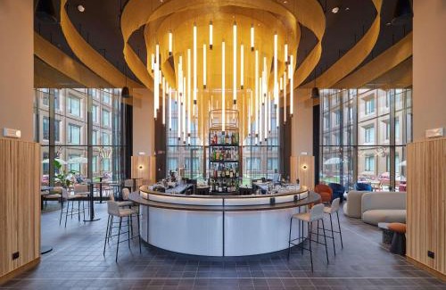 Vizzola Ticino Hotel | Elegant TRIBE Milano Malpensa: Pet-Friendly with Pool Access