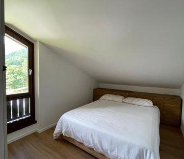 Giustino Apartment | Family-Friendly Trilocale Mansardato in Pinzolo