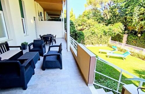 Colombare Apartment | Discover Sunset Beach: Private Garden & Oceanfront Escape