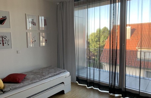 Stetten Apartment | Family-Friendly Retreat at Trilogie am See Wohnung Schmetterling