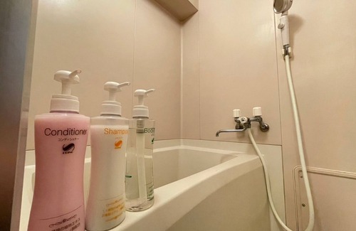 Namba Apartment | Inviting Triple Room in Osaka with Breakfast & Family Amenities