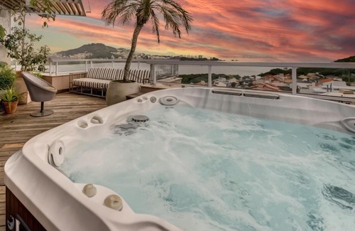 Joao Paulo Apartment | Indulge in a Triplex with Hot Tub & Breathtaking Views