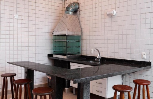 Vila Alzira Apartment | Elegant Triplex with Rooftop Pool in Guarujá