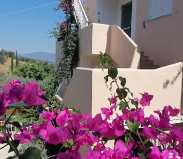 Galatas Apartment | Inviting Trizinia View Balcony with Family-Friendly Amenities