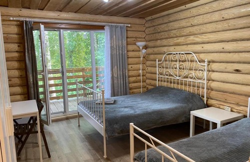 Pudozh House | Pet-Friendly Troitskiy Guest House with 9/10 Guest Rating