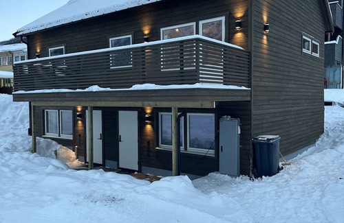 Tromsdalen House | Explore Tromsdalen Aurora Apartments with Pool and Spa Access