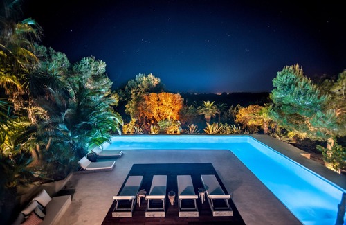 Sant Antoni de Portmany Villa | Exquisite Tropical Villa with Ocean Views & Private Pool
