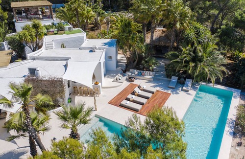 Sant Antoni de Portmany Villa | Exquisite Tropical Villa with Ocean Views & Private Pool