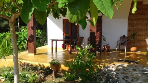 Tangalle House | Inviting Tropical Garden: Oceanfront Stay with Pool Access