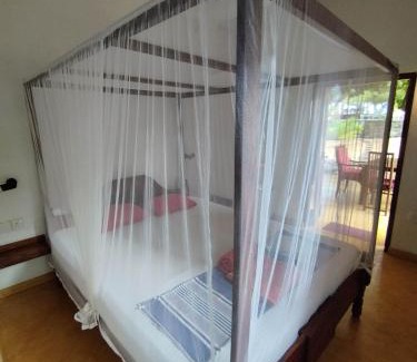 Tangalle House | Inviting Tropical Garden: Oceanfront Stay with Pool Access
