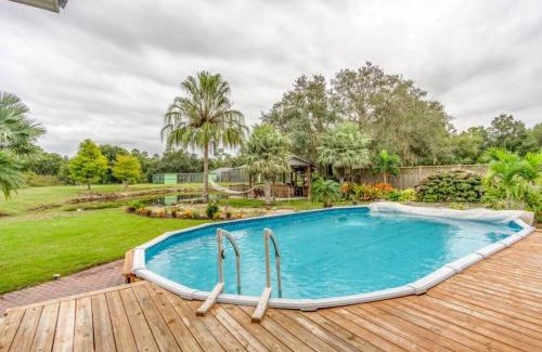 Punta Gorda House | Escape to a Tropical Getaway with Pool & Tiki Bar
