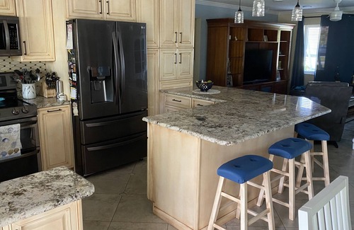 Palm City Cottage | Idyllic Waterfront Bungalow with Heated Pool & Kayaks