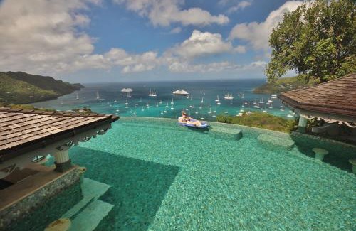 Friendship Bay Hotel | Experience Tropical Hideaway: 5-Star Oceanfront Escape