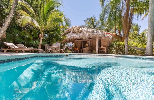 Bel Air House | Inviting Home with Lagoon Pool and Outdoor Living Space