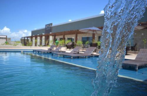 Aruanda Hotel | Oceanfront Tropical Mar Hotel with Pool and Family Dining