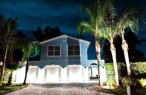 Longwood House | Indulgent Tropical Oasis with Heated Pool & Game Room